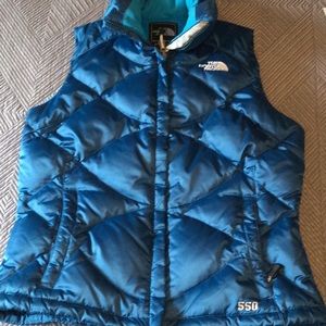 The North Face 550 XS blue puffer vest for women